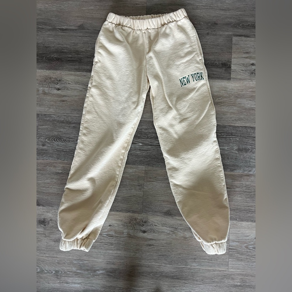 John Galt / Brandy Melville Cream New York Joggers One Size (Small)
